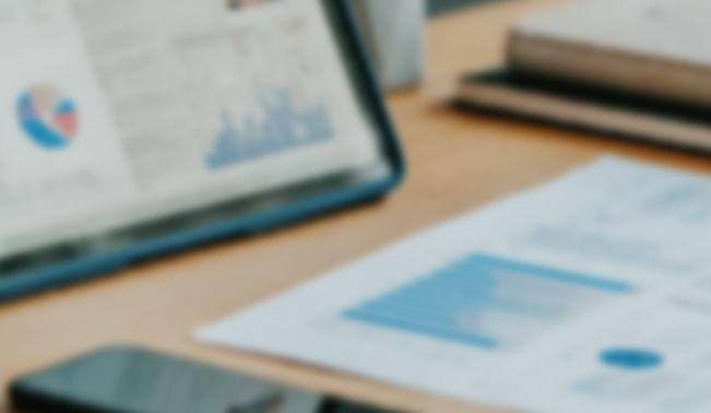 Monitor and iPad with data dashboard